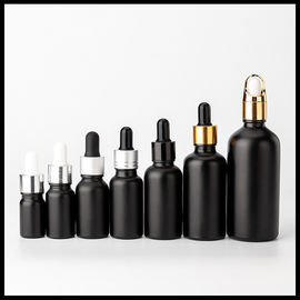 Chine Forme ronde givrée par noir d'emballage cosmétique de bouteilles en verre d'huile essentielle de couleur fournisseur